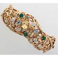 Gemset gold freeform bracelet 14k yg ca 1965 undulating and tapered hinged arch of gold wires with prongset spray of colorless and fancy color diamonds 170 cts tw zircons emeralds yellow sa