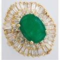 Emerald and diamond ballerina ring 14k yg ca 1980 oval faceted emerald approx 355 cts within undulating rows of circular and baguette cut diamonds approx 270 cts tw 106 gs gw size 5