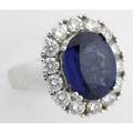 Large oval sapphire and diamond cluster ring 18k wg ca 1995 bright oval faceted blue sapphire 124 mm x 965 mm fourteen circular brilliant cut diamonds approx 140 cts tw 112 gs gw size 7