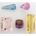 Five fine unmounted faceted gemstones five large specimens emerald cut morganite 102 cts 30mm x 23mm emerald cut heliodor 587 cts 37mm x 17mm trapezoid cut aquamarine 182 cts 30mm x 14mm