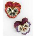 Two enameled gold pansy brooches with diamonds 14k yg ca 19201930 pansy in red shaded to white with hinged pendant bail centers diamond approx 15 ct the other pansy shaded purple and plum to y