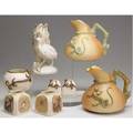 Royal worcester grouping includes two dragon pitchers one bird figural vase three smaller dragon decorated jars and two jars with bee decoration all late 19thearly 20th c tallest 6 34