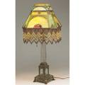 Moe bridges lamp leadedglass shade with eight panels domed top and beaded fringe the base with clear glass and bronze mounted signed base damage to glass in base ht 31