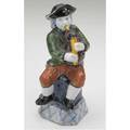 Delft figure bagpipe player with polychrome decoration 18th c some glaze flakes chips to hat brim marked illegibly ht 8 12