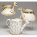Royal worcester three watering pitchers two with rams head gilded handle the third with basketweave design both late 19th c tallest 5 12
