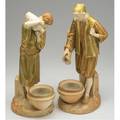 Royal worcester pair of figurines of near eastern water carriers late 19th c stamped 594 taller 17 12