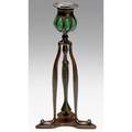 Tiffany studios threelegged bronze candlestick with blown green glass complete with snuffer on hook original patina stamped tiffany studios new york 1212 10 x 5