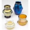 Tiffany studios four favrile glass cabinet vases two gold one blue and one opalescent all marked tallest 3