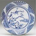 Dedham crackleware very rare plate painted by ned devlin with an asianinspired scene 1934 indigo registered stamp artist signature and date impressed double rabbits 8 14