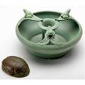 Walrath flower bowl with frogs covered in matte green glaze together with a brown and green scarab paperweight loss to tip of one leaf both signed walrath 4 12 x 8 and 3 34