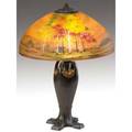 Handel table lamp with chipped glass shade reversepainted with a landscape over a threesocket fourfooted bronzed base original patina finish on cap touchedup shade stamped and signed handel 7