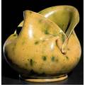 George ohr pinched and folded vessel covered in greenspeckled amber glaze a couple of touchups to rim stamped geoeohr biloxi miss 3 14 x 3 34
