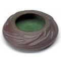 Van briggle squat vessel embossed with leaves and covered in purple and green glaze 1906 a few glaze bubbles aa van briggle 1906 411 1 12 x 5 14