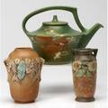 Roseville three pieces green snowberry teapot brown clemana vase and dahlrose vase tallest 6