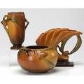 Roseville three brown pine cone vases 2784 4726 and one 6 12 ovoid two marked