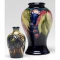Moorcroft pomegranate vase together with an abstract vase moorcroft 6 12