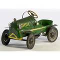 Childs steelpedal car with green paint yellow trim and rubber on steel wheels ca 19401950 22 x 36