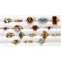 Gold and gemstone rings seventeen rings include diamonds rubies garnets topaz citrine opal amethyst ca 19202000 eleven rings 14k six rings 10k 614 gs