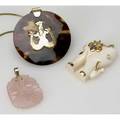 Large pendants with gold mounts three pendants in 14k carved rose quartz ivory elephant with gemstone decorations and a 3 tortoise shell disk with mermaid marked c sibirign 14k chain