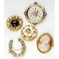Gold brooches five brooches most in 14k yg include garnet and diamonds watch face with enameled pansies turquoise and seed pearl blue zircon 10k cameo brooch 545 gs