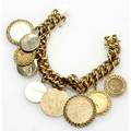 Gold charm bracelet heavy 18k yg curb link with 1912 gold 2 12 dollar charm 1912 gold 5 dollar charm and seven 14k disk charms some uninscribed 2086 gs 7 34