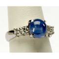 Blue star sapphire  diamond platinum ring fine sapphire weighing 348 gs flanked by four circular brilliantcut diamonds 43 ct tw ca 1980 66 gs size 6