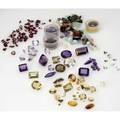 Unmounted mixed gemstones seventyone stones include 152 cts green beryl 51 cts tw rhodolites 26 cts amethyst 368 cts ametrine assorted citrines pearls tourmalines amethysts 1100 cts