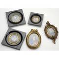 Portrait miniatures five paintings of women two in oval gilded frames three in black lacquer frames largest 5 14 x 5 14