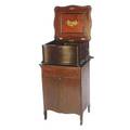 Regina doublecomb serpentine front mahogany music box accompanied by mahogany music box cabinet with sixtynine 15 12 discs 44 12 x 27 x 21