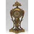 French mantle clock of dore bronze depicting a cherub playing horns 20