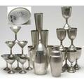 Barware spun aluminum barware set with matte ground and bright bamboo decoration including martini shaker pitcher and twentyfour drinking vessels marked shaker 8 12