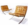 Mies van der rohe pair of barcelona chairs with original tan leather tufted cushions on leather straps each 31 x 31 x 30