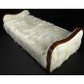 Jean royere daybed covered in goat fur with bent maple edges 23 x 83 x 38