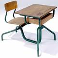 Jean prouve oak and painted steel student desk and chair unit with sliding iron inkwell 25 12 x 23 12 x 32