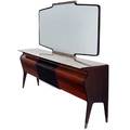 Osvaldo borsani mahogany mirrored sideboard with beige marble top and brasscapped feet a related wallmounted version of this piece is illustrated in robert alois larredamento moderno 5th ser