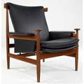 Finn juhl  john stuart bwana teak armchair with black leather cushions branded made in denmark with john stuart circular metal tag 36 12 x 33 x 34