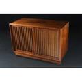 George nakashima walnut credenza its two grass clothbacked grilled doors enclosing two drawers 28 12 x 22 x 20