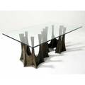 Paul evans sculpted bronze dining table with plate glass top resting on a serpentine stalagmite base 28 34 x 72 x 44