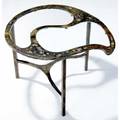 Silas seandel bronze occasional table its biomorphic top inset with two glass panels 17 x 25 x 21