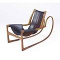 Wendell castle early and important sculpted oak sleigh chair with hard leather sling seat 1963 an early masterwork by wendell castle the piece expertly combines the sleekness of american industria