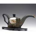 James lawton sculptural porcelain teapot with trivet parallelogram teapot 1984 provenance the derek mason and daniel jacobs collection 7 34 x 17 12