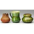 George ohr three vessels bulbous bisque vase with folded rim pitcher covered in sheer green glaze restored rim and vase with torn rim covered in sheer green and yellow several chips around insid