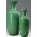 Teco two tall vases covered in smooth matte green glaze stamped teco 11 14 and 14 14