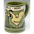 Saturday evening girls mug incised with roosters on a green ground and the early bird a rare and precious example minute glaze flake marked seg fr 26509 in ink 4 x 4