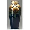 Rorstrand porcelain vase decorated by nils lindstrom with large reticulated ivory blossoms and brown stems against a cobalt ground small flat chip at foot ring blue ink mark 14 34 x 6 14