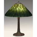 Handel table lamp its chipped ice shade reverse and obversepainted with tall green reeds painted on the exterior against a yellow ground over a threesocket tree trunk base shade signed os pate