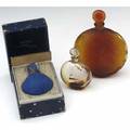Rene lalique three perfume bottles for worth vers le jour of amber glass c 1926 dans la nuit clear with blue enamel includes original box with some wear c 1924 and vers toi molded mar