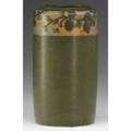 Walrath cylindrical vase painted with a band of green pine boughs against a yellow and blue sky on a matte green ground exhibited in american arts  crafts from the collection of alexandra and sid