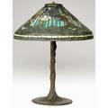 Tiffany studios exceptional table lamp its poppy shade resting on a spectacular twisted vine threesocket bronze base exhibited in amercan arts  crafts from the collection of alexandra and sidney