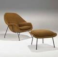 Eero saarinen knoll early womb chair and ottoman in patterned upholstery on black enameled steel base chair 35 14 x 38 14 x 30 14 ottoman 15 12 x 25 12 x 19